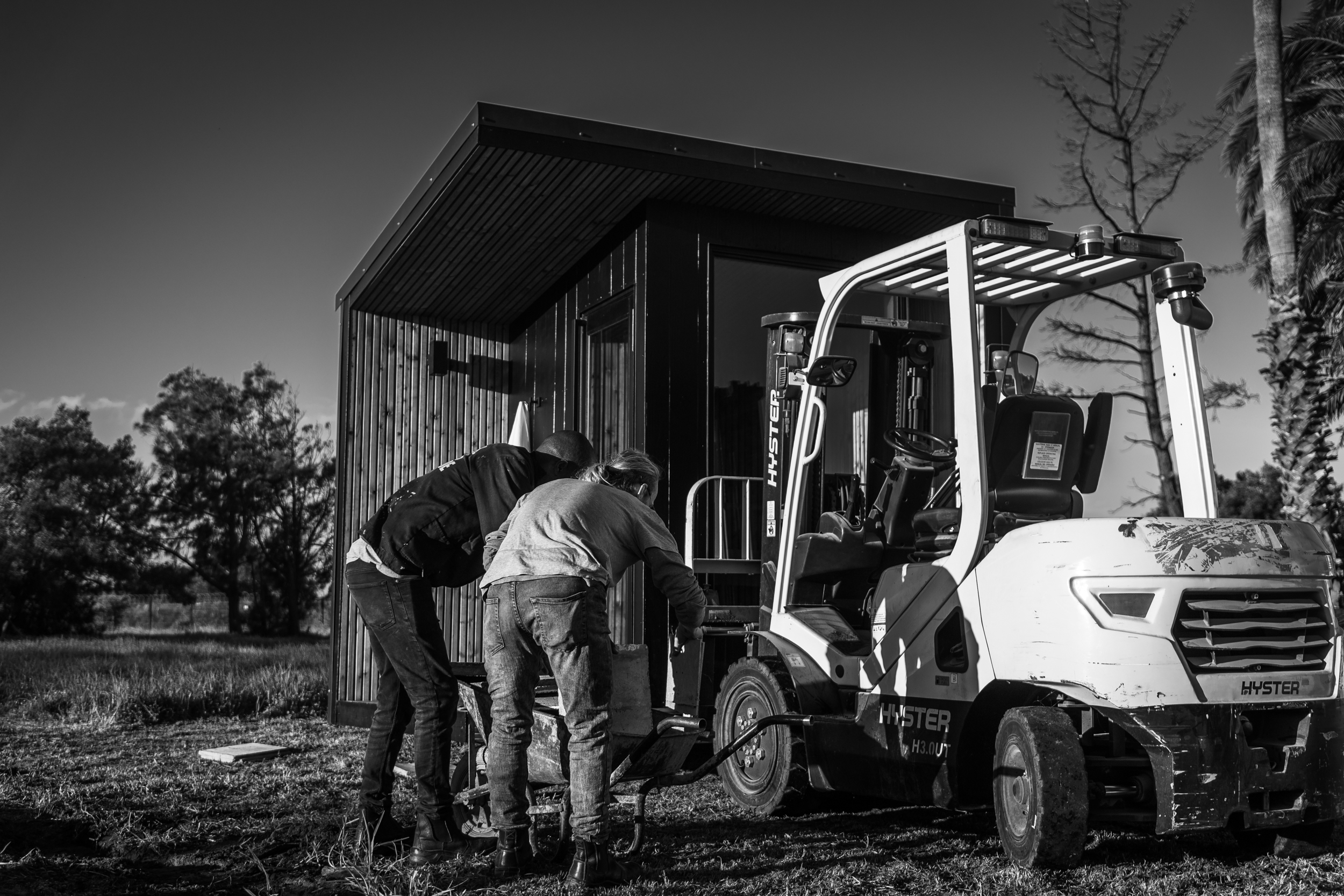 Khaya Spas team building a sauna in the workshop